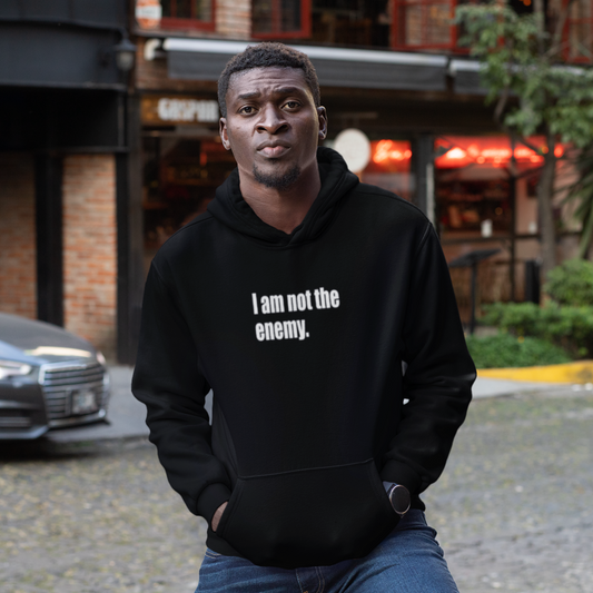 "I am not the enemy" Unisex Heavy Blend™ Hooded Sweatshirt